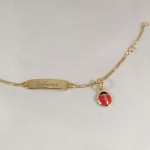 Taufarmband Gold mit Marienkfer